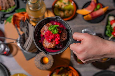 Nordic chef preparing traditional Sámi cuisine with arctic ingredients