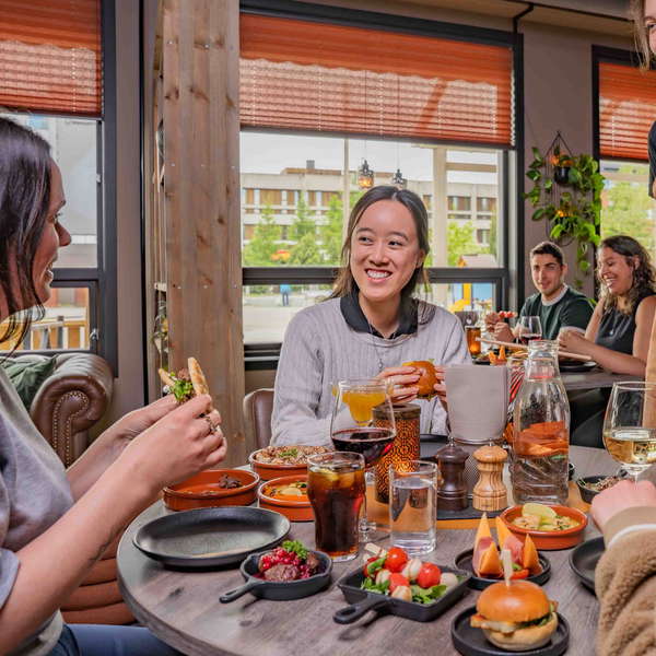 Arctic tapas dishes featuring reindeer, king crab, and cloudberries at Raus Social restaurant in Alta